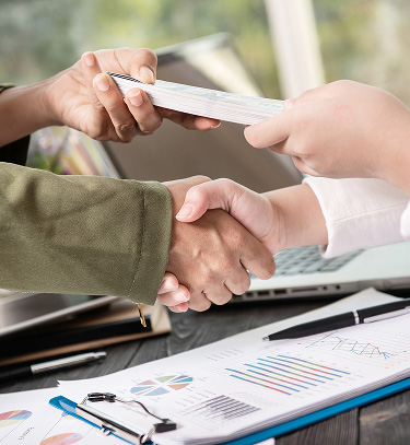 business-people-shaking-hands-finishing-up-meeting-2